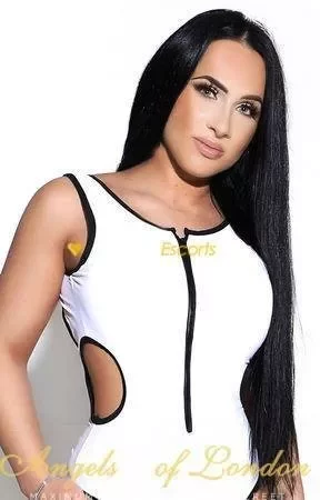 This dark-haired 400£/Hour